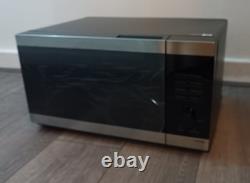 Brand New Stainless Steel Samsung Microwave 1000w With A Tiny Dent In The Box