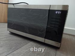 Brand New Stainless Steel Samsung Microwave 1000w With A Tiny Dent In The Box