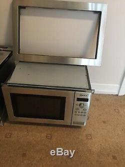 NEFF BUILT IN STAINLESS STEEL MICROWAVE OVEN With SS SURROUND