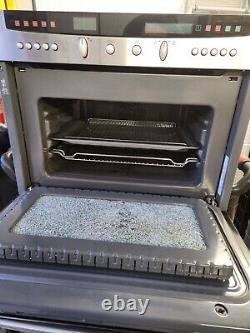 Neff combi microwave B6774.0GB works (door glass has shattered) read description