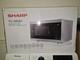 New Sharp Yc-mg81 28 Litre 900w Digital Microwave With 1100w Grill. Silver