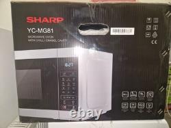 New Sharp YC-MG81 28 Litre 900W Digital Microwave with 1100W Grill. Silver